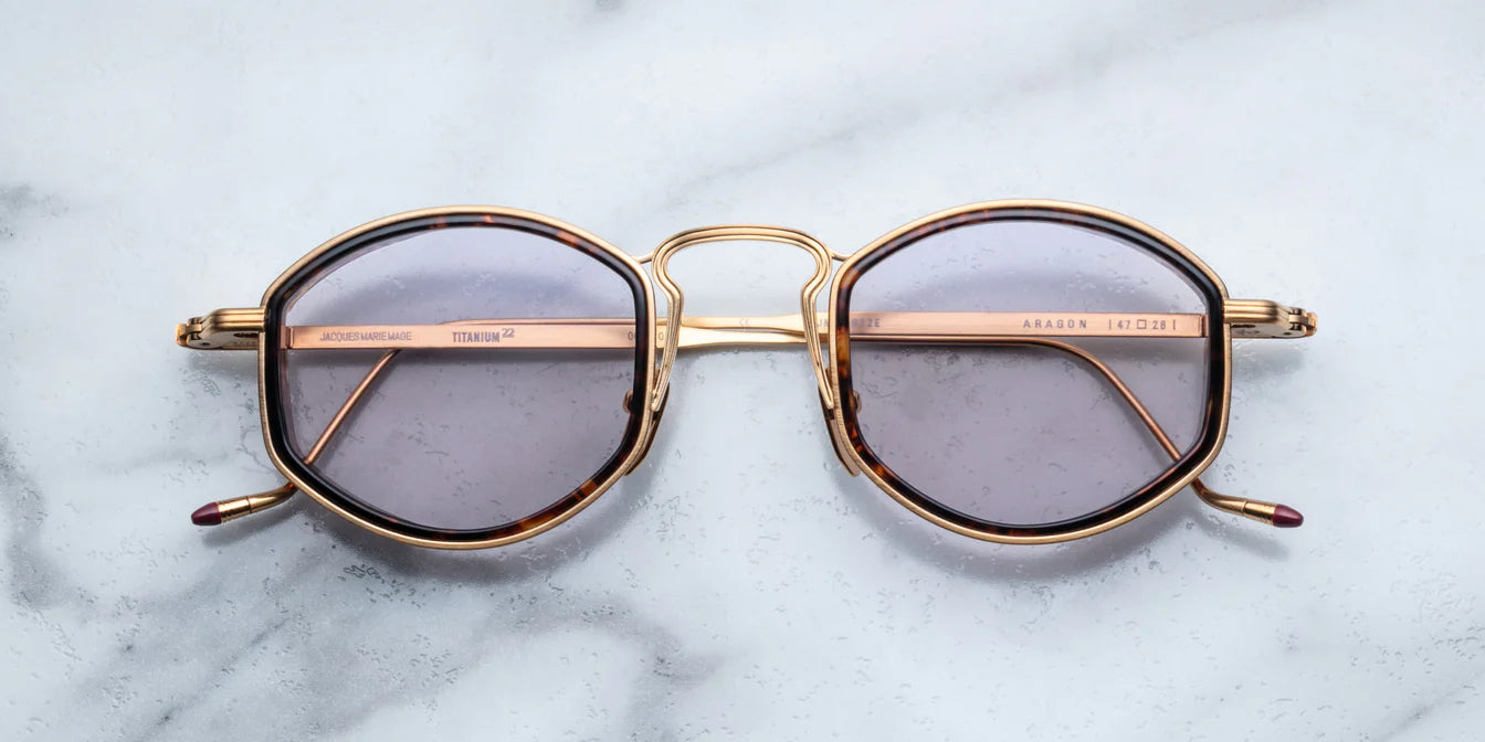 JMM Aragon oval shaped gold frames with innfer tortishell rim and key hold bridge