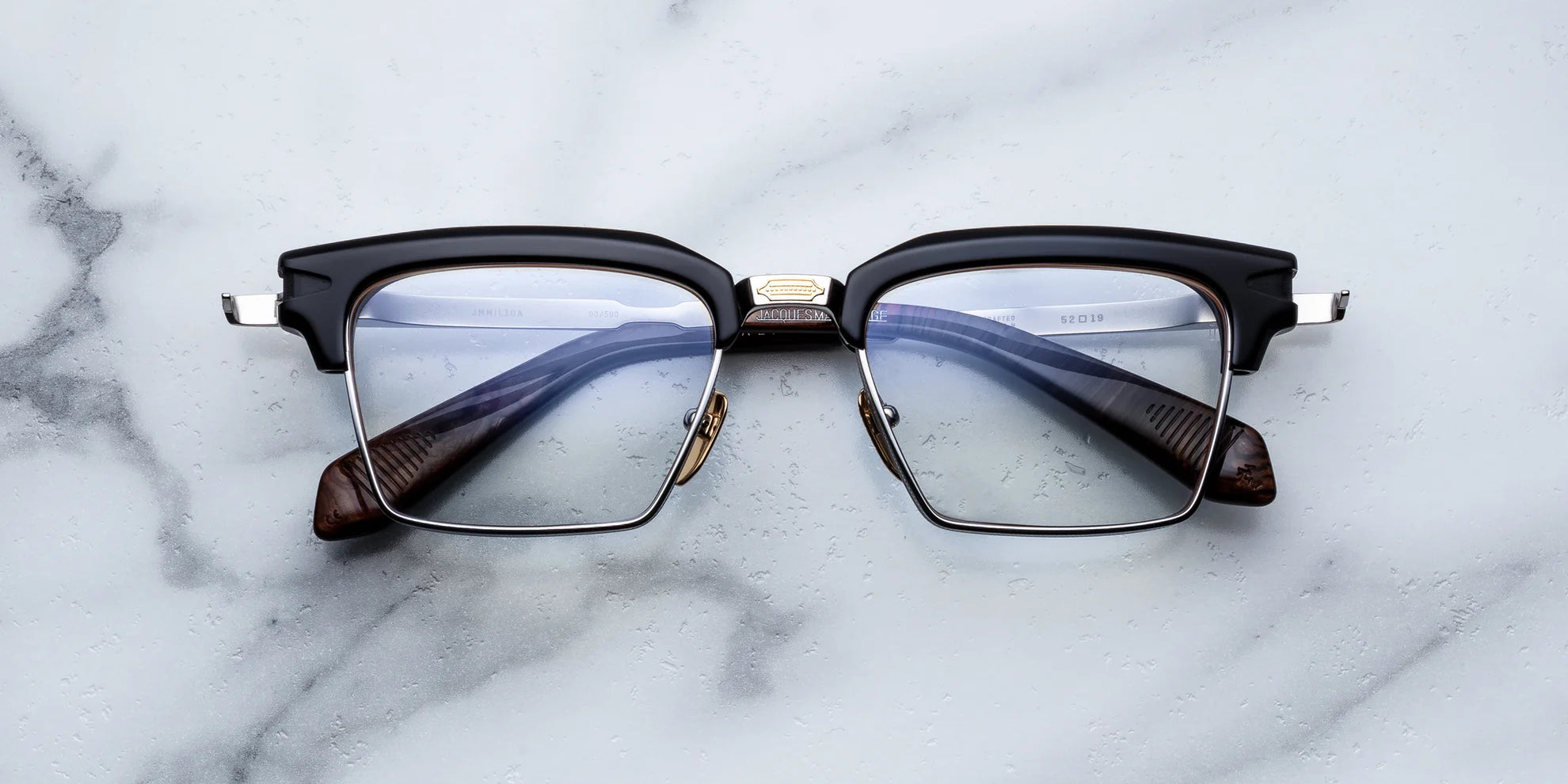 JMM alin Noir X black acetate top. with silver bottom rim