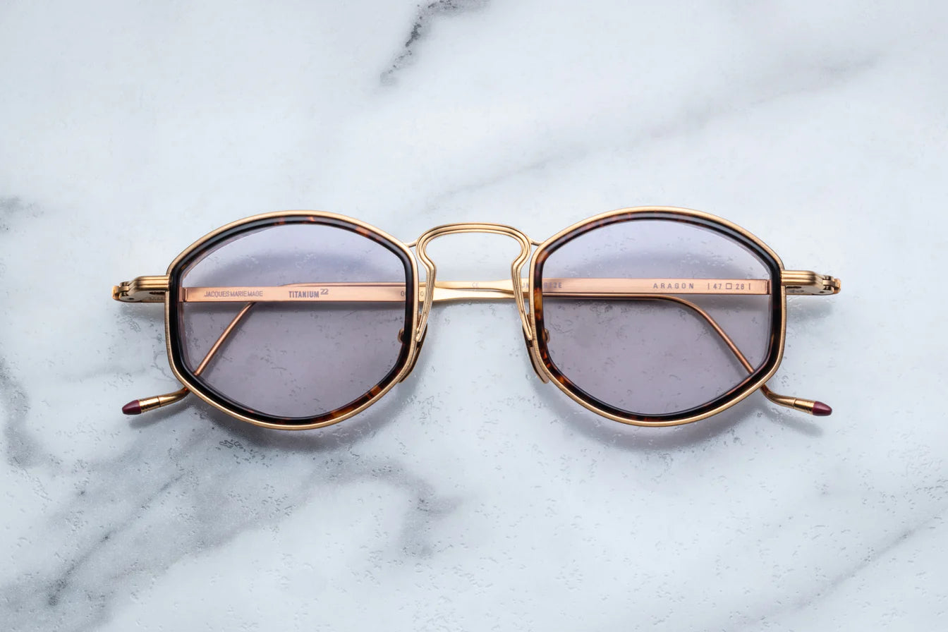 JMM Aragon oval shaped gold frames with innfer tortishell rim and key hold bridge