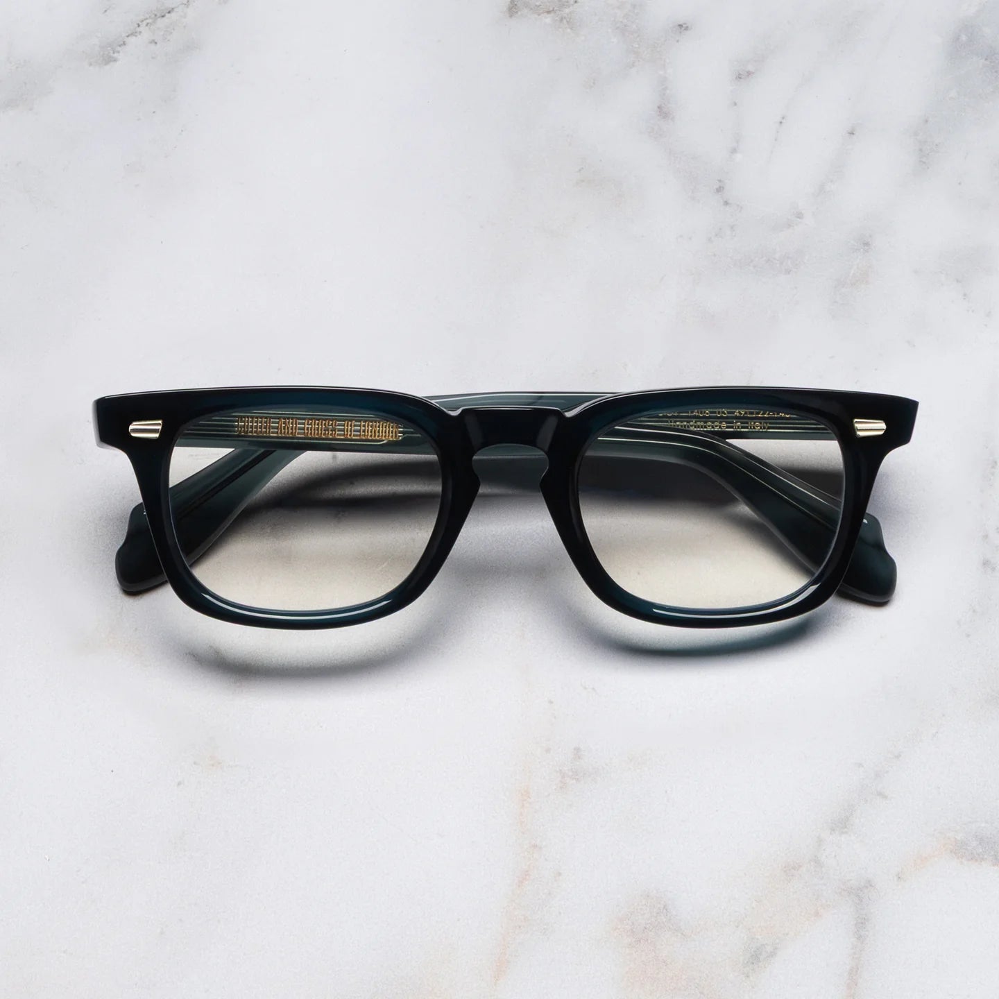 CG 1406 glasses on marble background