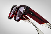 Deep red shell sunglass with sterling silver arrow head pin on the sides side view