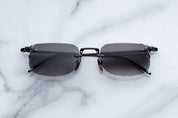 Rimless sunglass with black metal finishes