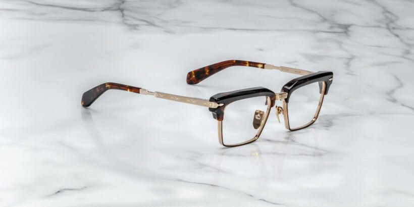 JMM Alin dark havana with acetate top rim and metal bottom rim wiht overlying acetate on the top side view