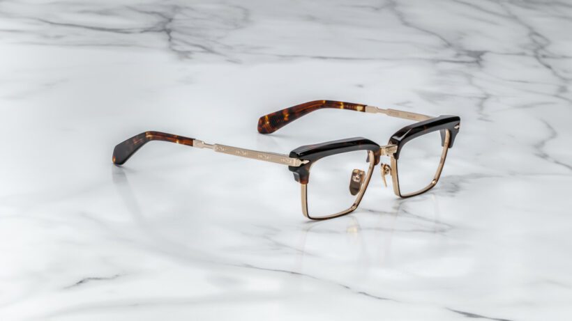 JMM Alin dark havana with acetate top rim and metal bottom rim wiht overlying acetate on the top side view