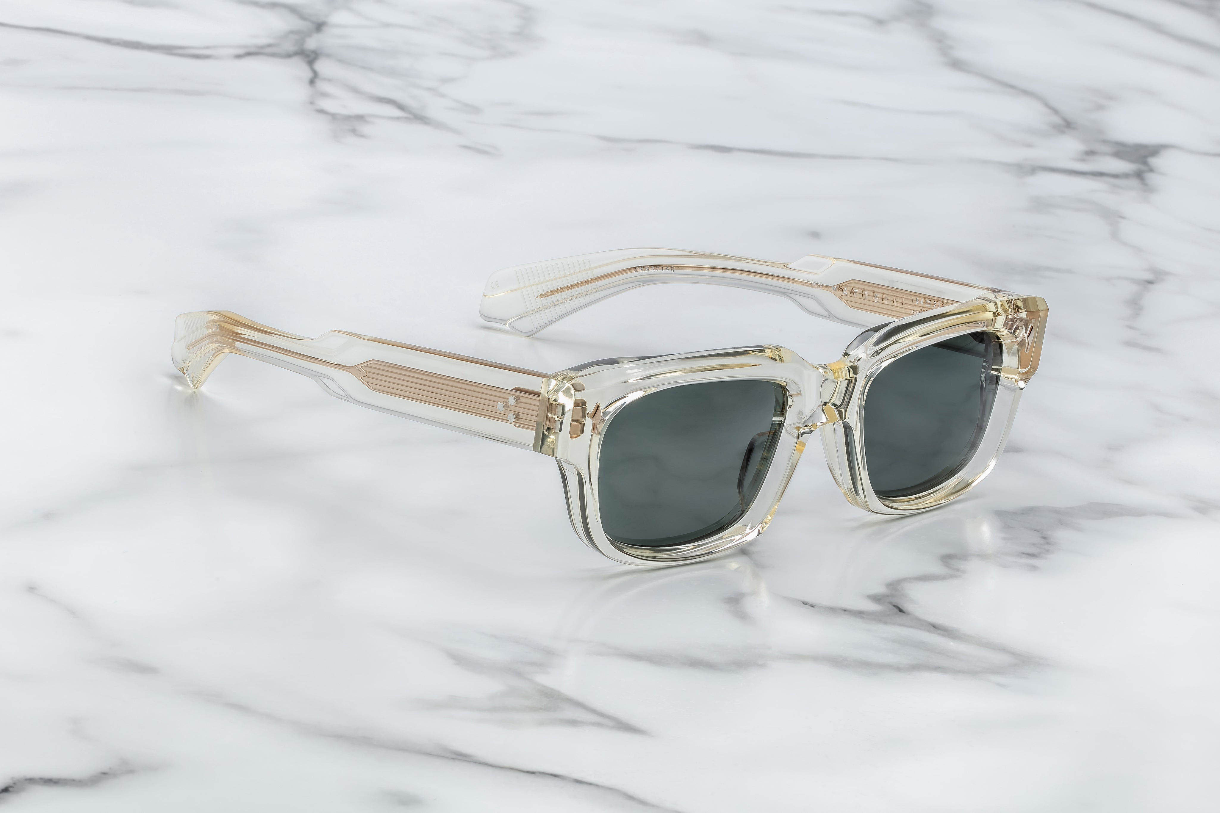 champagne colours sunglasses with sterling silver arrow head motify on the sides JMM mattei brut side view