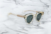 round sunglass in crystal with silver arrow pin motif on the sides side view