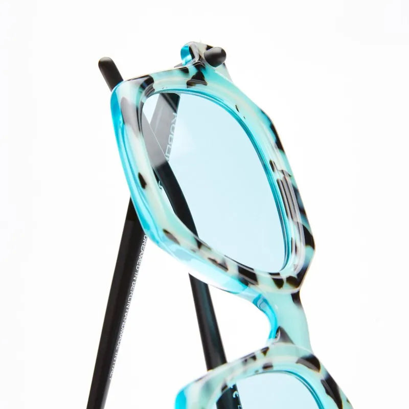 Hexagon shaped frame with blue tortishell