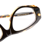 close up of an angular frame in black and toritshell