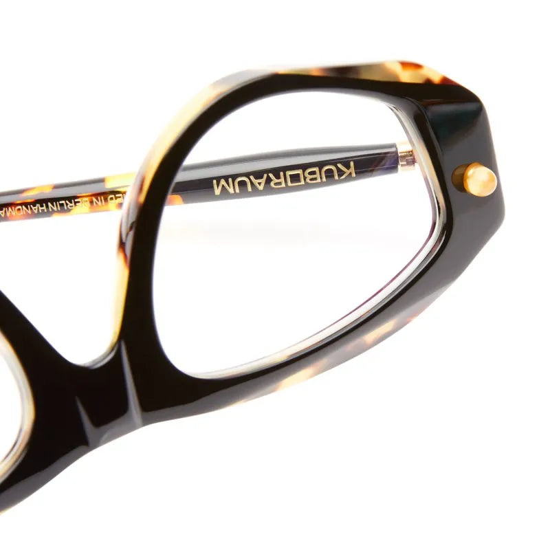 close up of an angular frame in black and toritshell