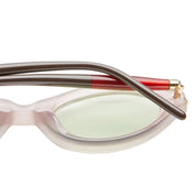 close up of some pink frames with balck and red temples