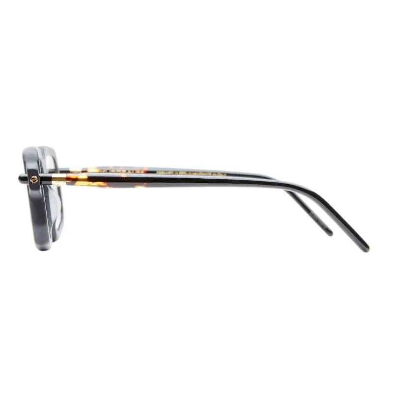 side view of sunglass frame with tort and black temples