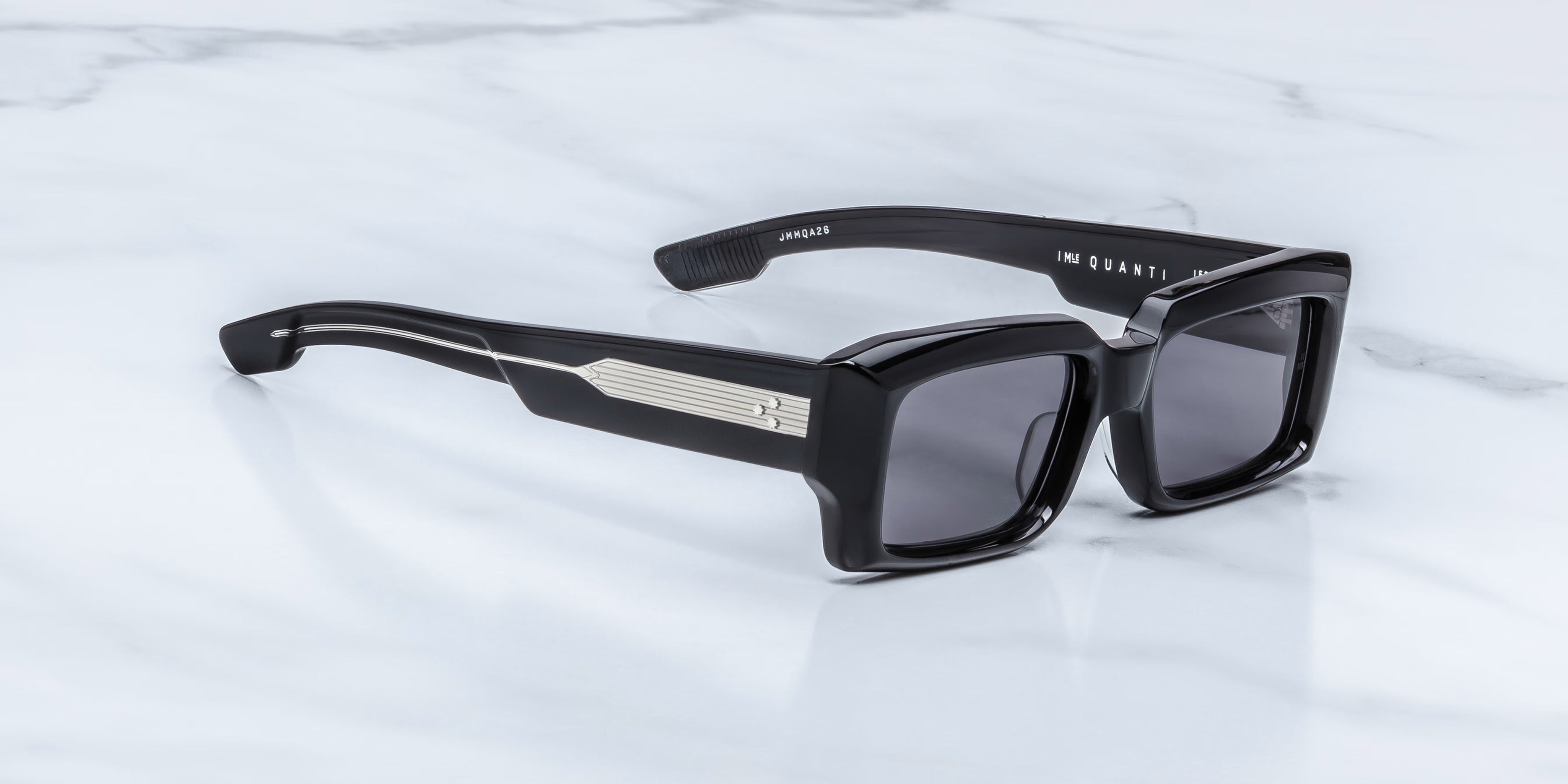 side view of black rectangular sunglass with expose wire core