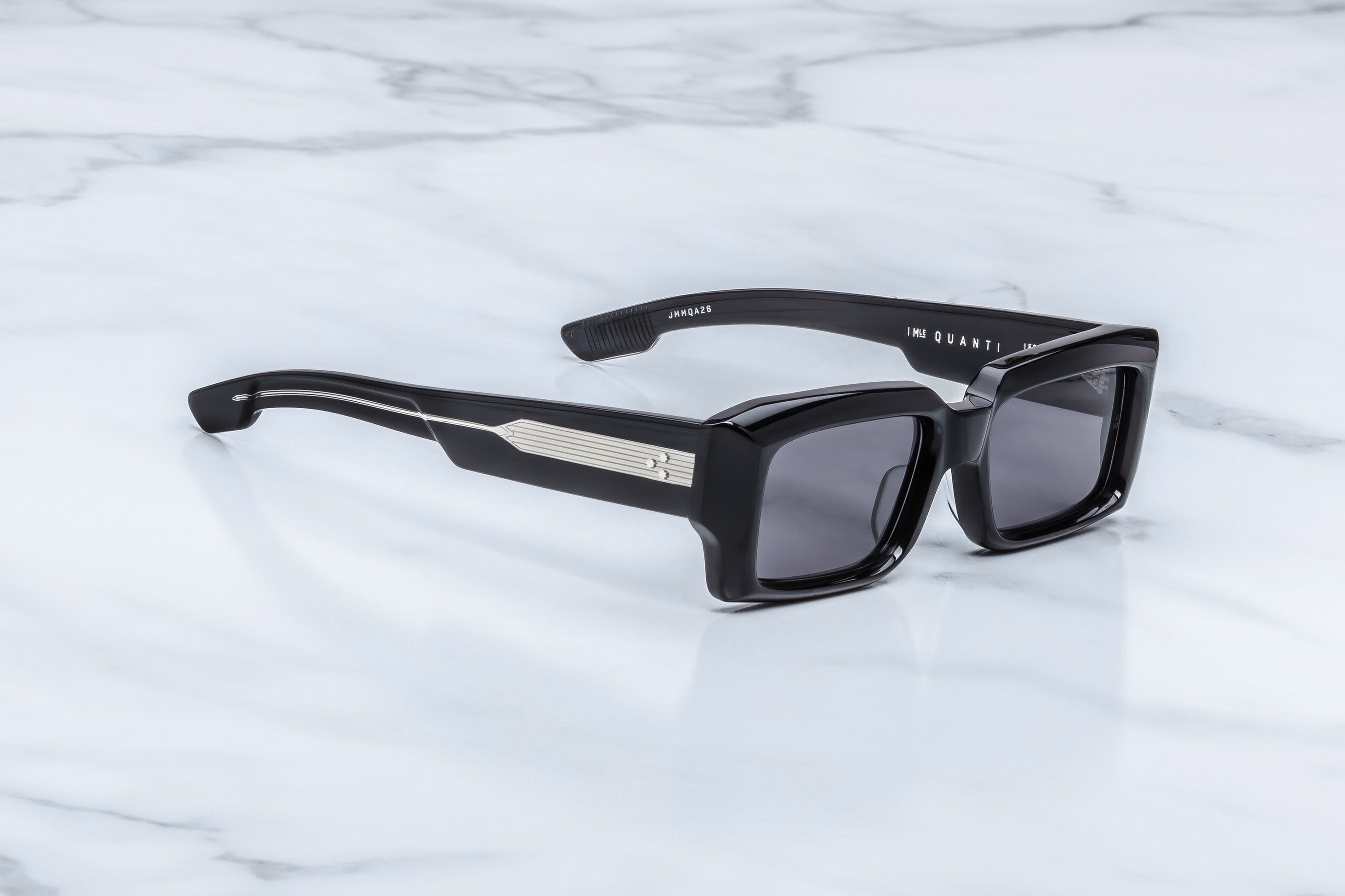 side view of black rectangular sunglass with expose wire core