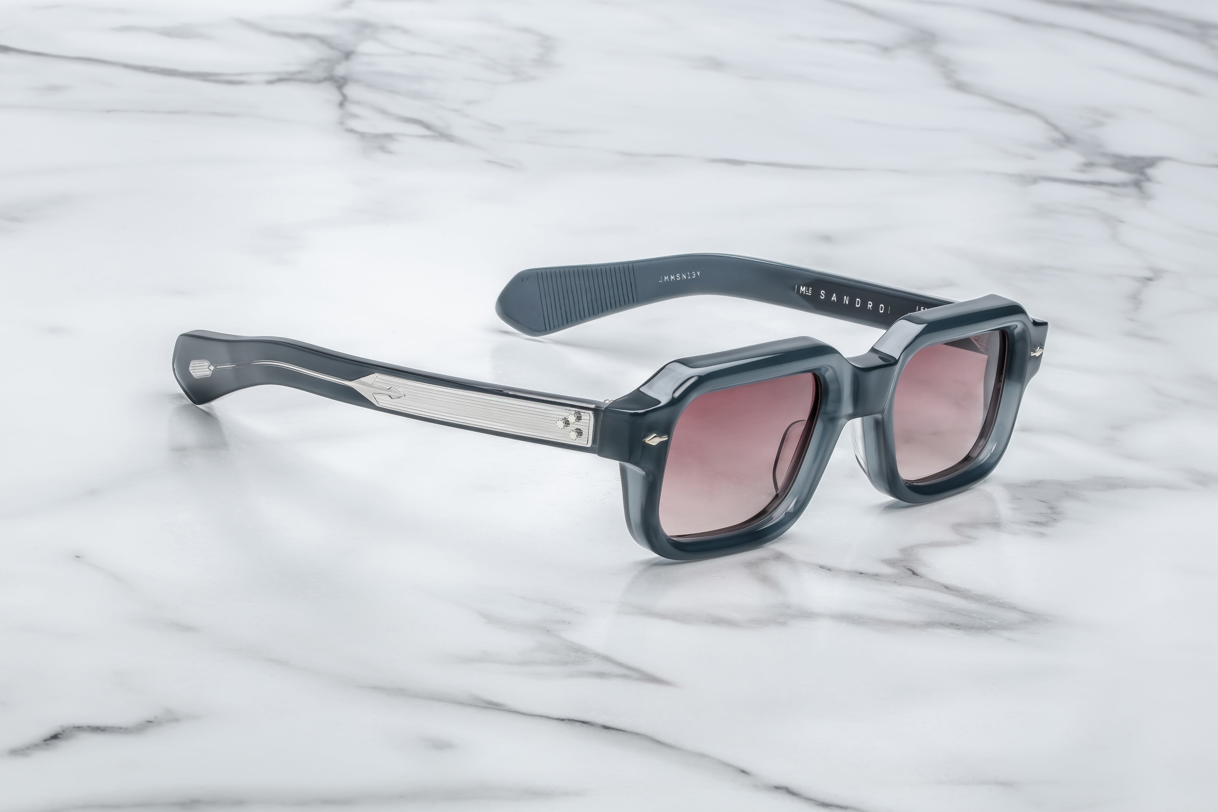 blue rectangular sunglasses with silver detail on temples