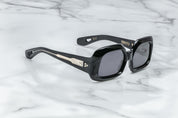 Large black sunglasses with detal on the temples