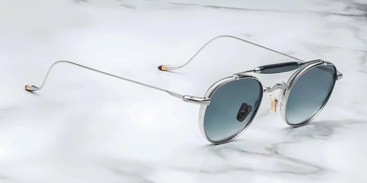 Silver metal aviator style sunglass with double bridge and acetate finish at the top side view