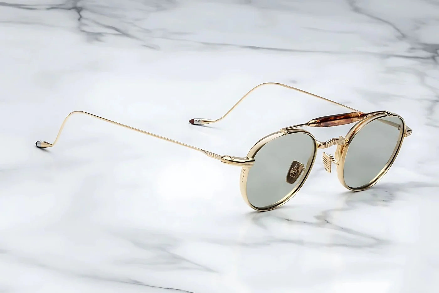 Silver metal aviator style sunglass with double bridge and acetate finish at the top 