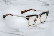 JMM Alin side view gold bottom rim with silver/gold detail on the temples