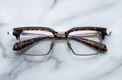JMM alin beau tortishell top rim with gold bottom rim