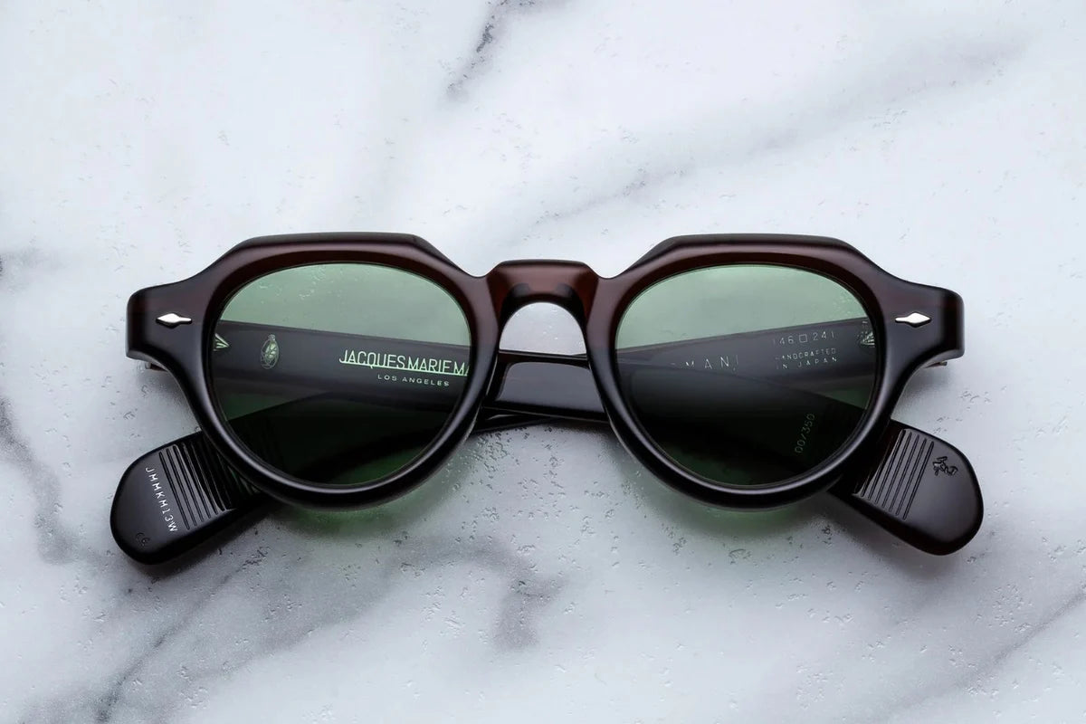 A pair of jacques marie mage frames with panto shape in a transparent brown zoltar