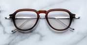 aviator style acetate frme in translucent broand and silver temples