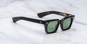 side view of JMM Quentin noir 9 with silver star detail on temple